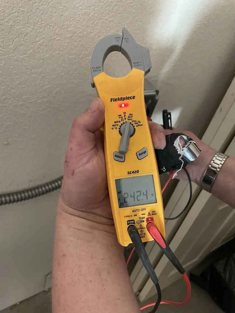 Voltage testing with clamp meter during Aluminum Wiring Replacement in Powell